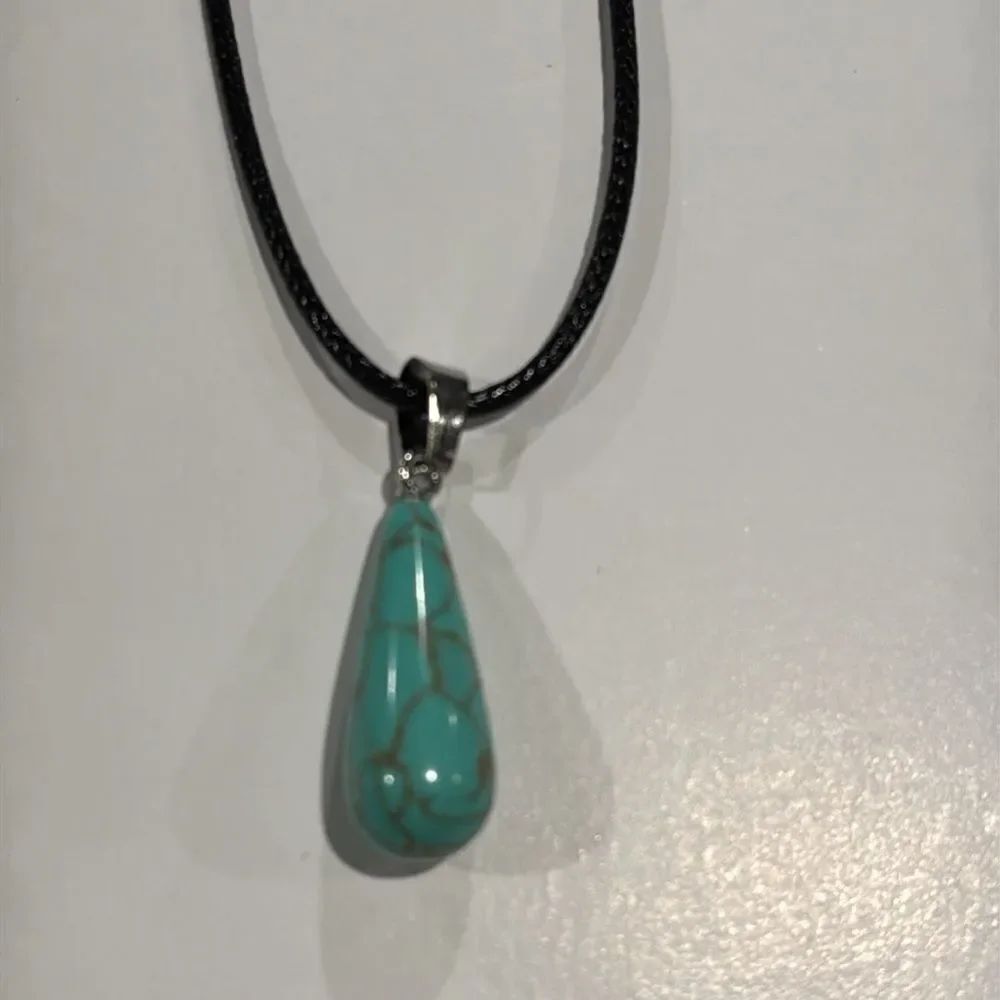 Elegant Silver and Turquoise Pendant Necklace